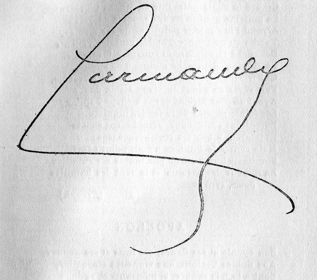 A handwritten signature on grey, uneven paper, with faint printed text showing through from the other side of the page